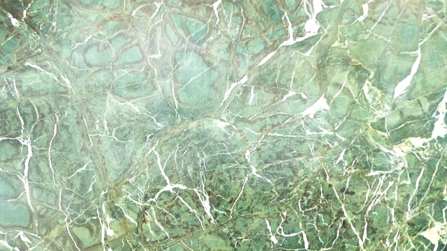 抽象的背景画面。绿色大理石纹理随机排列的动画。视频下载