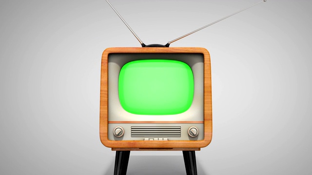 复古电视，木制风格复古电视接收器与绿色屏幕。相机变焦。你可以用画面或图片代替绿屏。视频素材