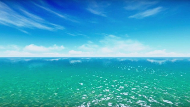 深蓝色天空下美丽的开阔海洋视频下载