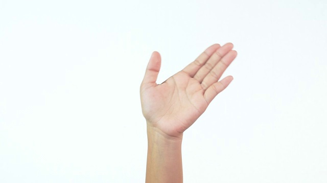 手的特写，挥手，说问候或再见，做手势孤立的白色背景。视频素材