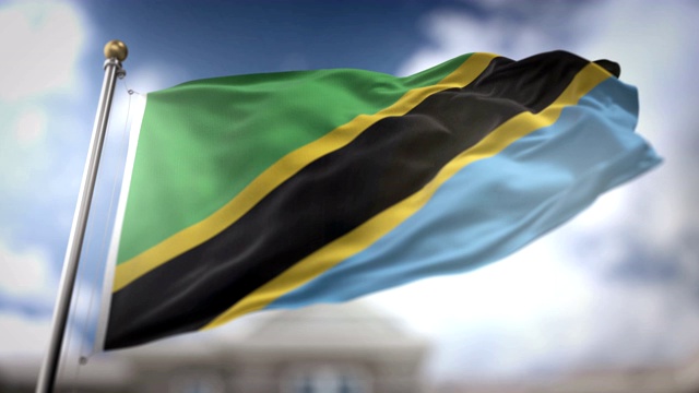坦桑尼亚国旗挥舞慢动作3D渲染蓝天背景-无缝循环4K视频下载