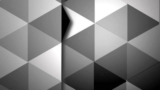 曲面上的三角形在不同的暗示下依次变灰。视频素材