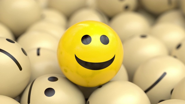 快乐的乐观球在一堆悲伤球上点头和微笑。视频素材