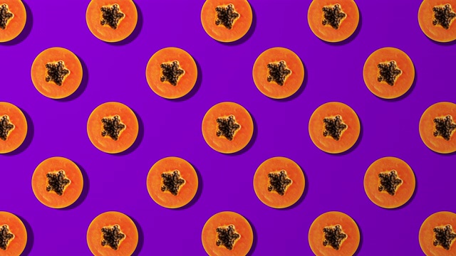 木瓜切片纺丝花纹，紫色背景视频素材