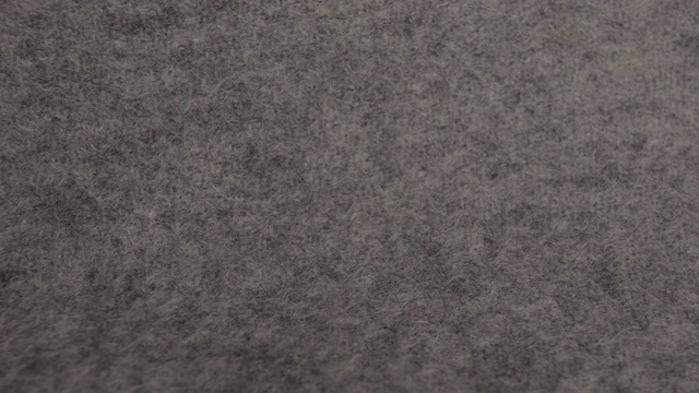 羊绒柔软蓬松的灰色羊毛微距拍摄。视频下载