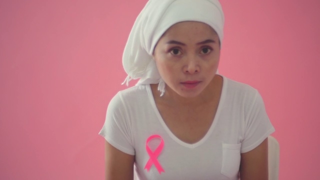 癌症:粉红色背景视频下载