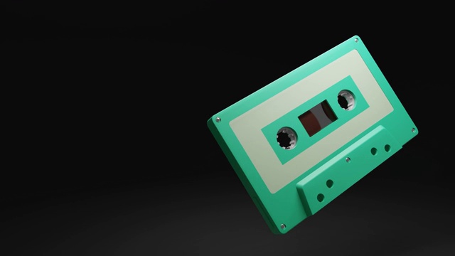 淡绿色盒式磁带孤立在黑色文本空间。可循环3d动画。视频素材