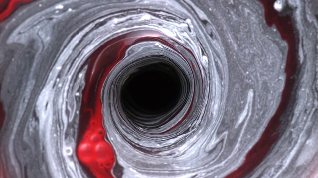SLO MO LD水漩涡画在黑色，红色和白色颜色视频素材