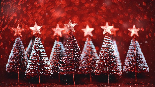 圣诞树上闪烁着红色的闪闪发光的彩灯，摇曳着节日的背景。节日贺卡视频下载
