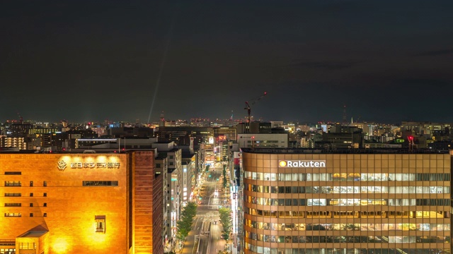 4K超高清从白天到夜晚延时:福冈市区博多的鸟瞰图视频下载