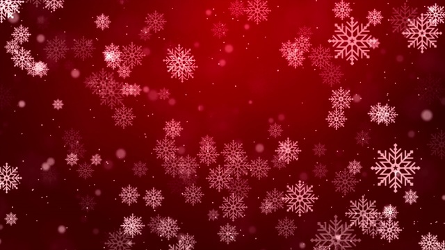 红色的雪花在空中飞舞。雪花，雪圈背景。视频素材