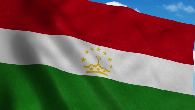 塔吉克斯坦国旗迎风飘扬，蓝天为背景。4 k视频素材