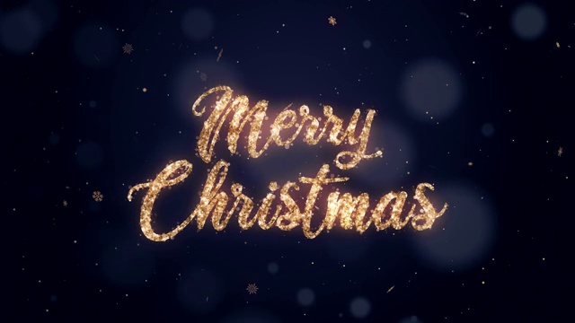 手写的圣诞快乐文字与金色闪光在蓝色的背景。视频下载