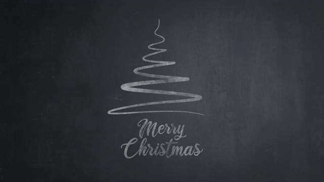 手绘圣诞快乐的文字与圣诞树在黑板上视频下载