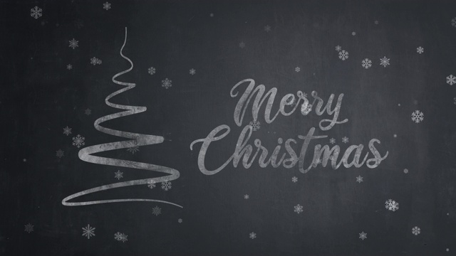 手绘圣诞快乐的文字与圣诞树在黑板上视频下载