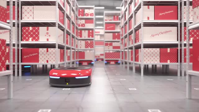 在自动仓库无缝循环中自动移动圣诞礼物的机器人视频素材