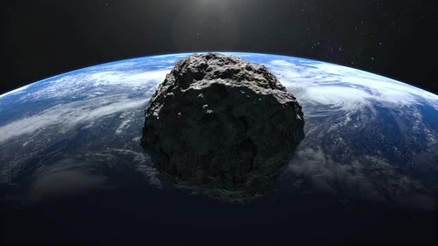 一颗小行星落到了地球上。小行星旋转并快速地飞向地球。星空。4 k。星星在闪烁。3 d渲染。美国国家航空航天局视频素材