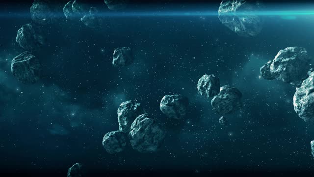 在恒星和星云的背景下，小行星在空旷的空间中从左向右缓慢飞行。空间动画可以用作背景或屏幕保护程序视频下载