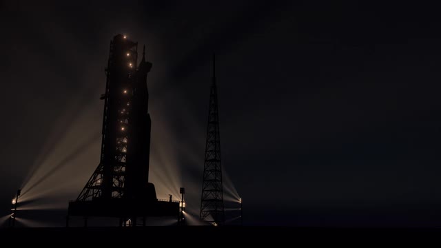 日出背景下，大型重型火箭(太空发射系统)在发射台上视频素材