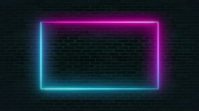 砖墙上的动画霓虹发光框架。视频素材