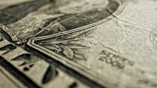 特写微距摄影拍摄的乔治·华盛顿总统的正面2009美元一美元钞票视频素材