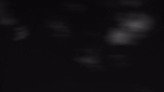 夜空星星的时间间隔为4K。黑色和白色。视频素材
