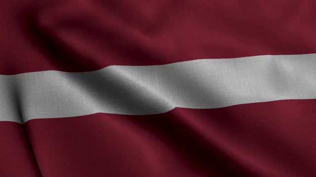 拉脱维亚缎旗。飘扬的拉脱维亚国旗的织物纹理，真实的纹理飘扬的拉脱维亚国旗视频素材