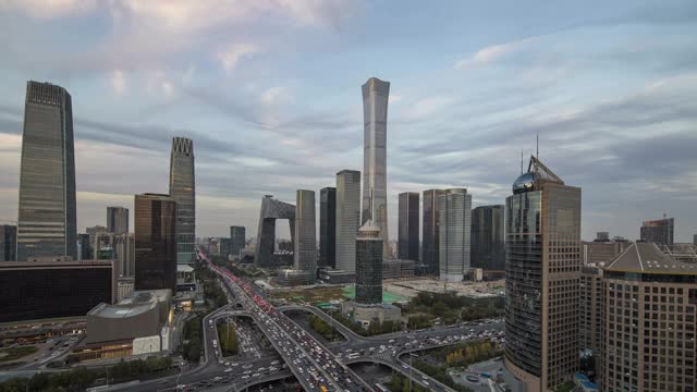 日日夜夜在北京中央商务区高楼大厦天际线上，中国城市景观视频下载