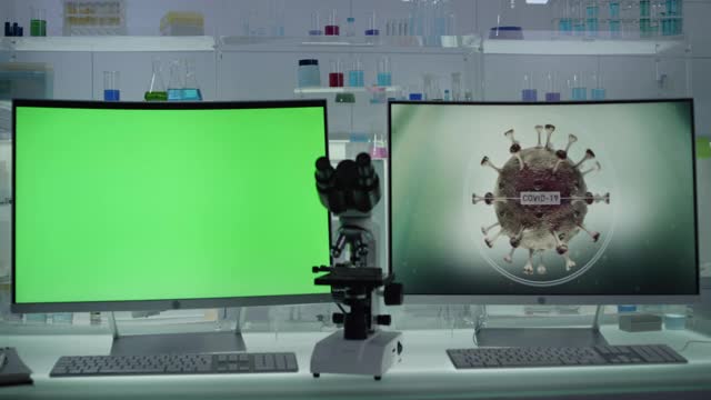 2019冠状病毒病——未来的实验室室内。冠状病毒的研究。电脑屏幕上的色度键视频下载