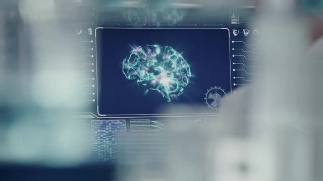 科学家在实验室。电脑屏幕上的大脑模型研究视频素材
