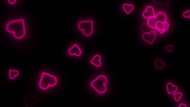 飞霓虹心动画，黑色背景，情人节概念。视频下载