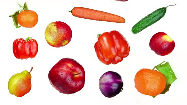 美味的水果和蔬菜落在白色的背景上视频下载