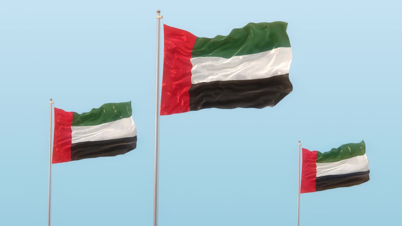 阿拉伯联合酋长国的国旗在蓝天的风中飘扬视频下载