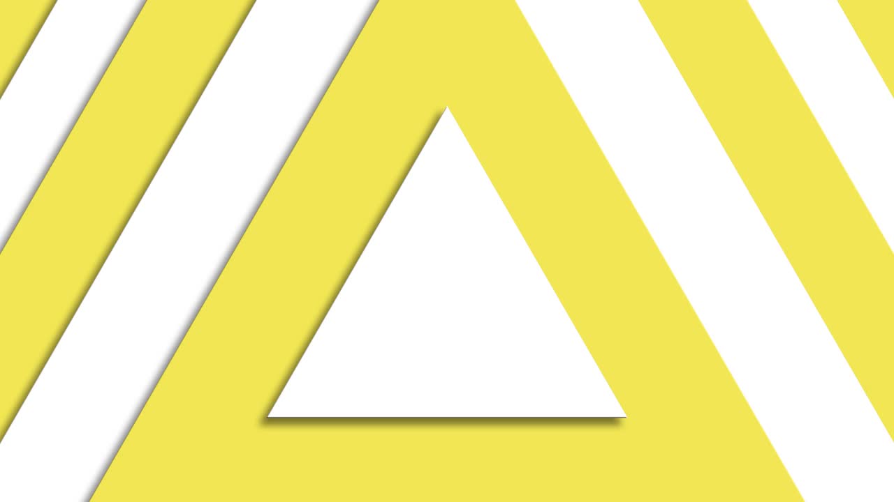 黄色和白色三角形与现实的阴影运动图形背景。简单的背景动画视频素材