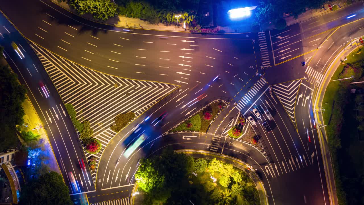 夜光照亮三亚交通十字路口航拍时间4k中国视频素材