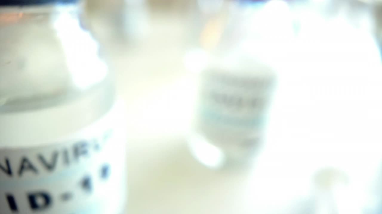 COVID-19疫苗剂量注射器离焦宏瓶4K系列视频视频下载