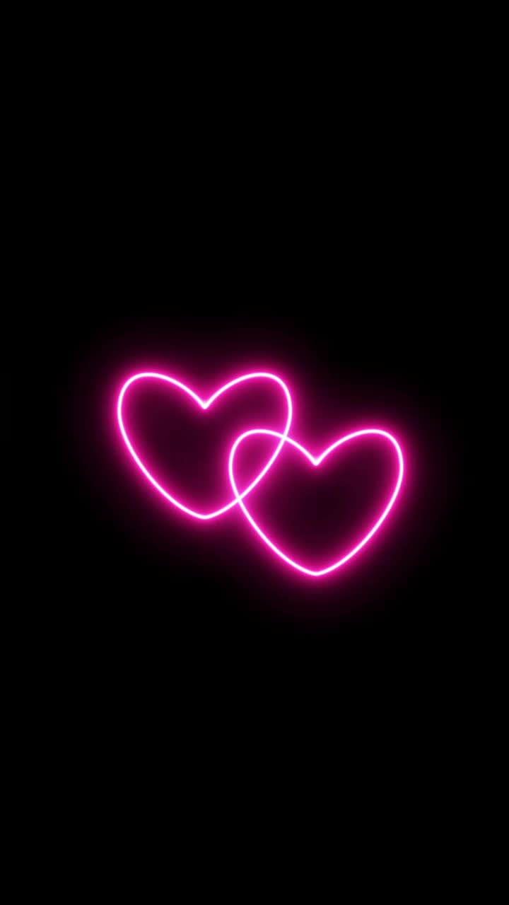 两颗跳动的心在一起。粉色霓虹爱的标志动画视频。循环现实的动画。视频素材