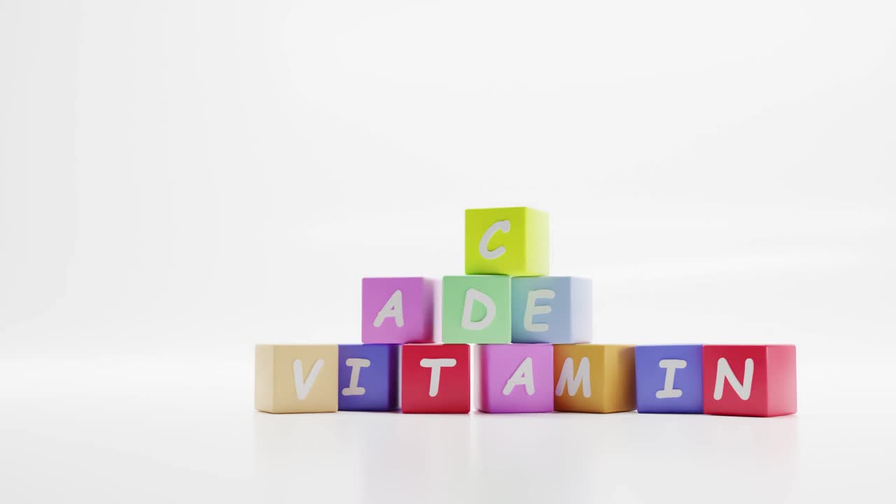 单词维生素，药丸A C D E彩色方块，儿童教育游戏与字母有关的健康和药物。卡通塔，金字塔的方块与动态的球和球在白色的背景视频下载