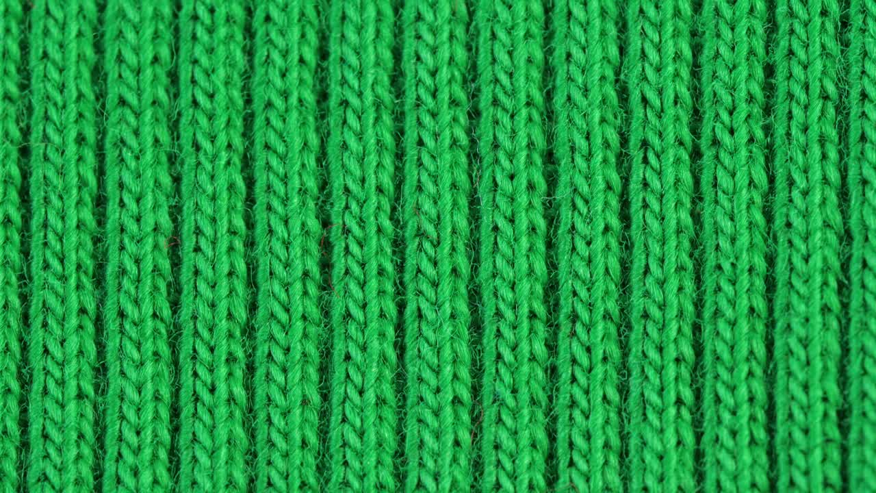 纺织品背景-绿色的棉织物，有平纹结构。宏开枪。视频素材
