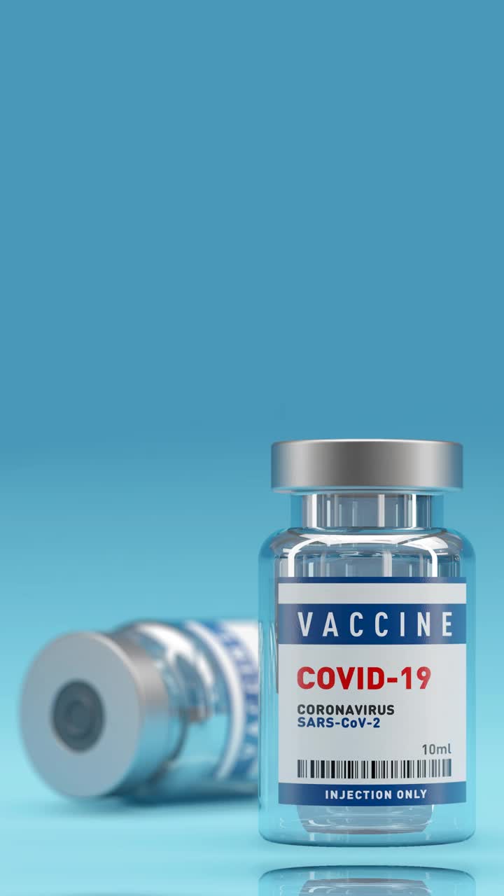 Covid-19冠状病毒疫苗概念瓶瓶旋转。景深。视频下载
