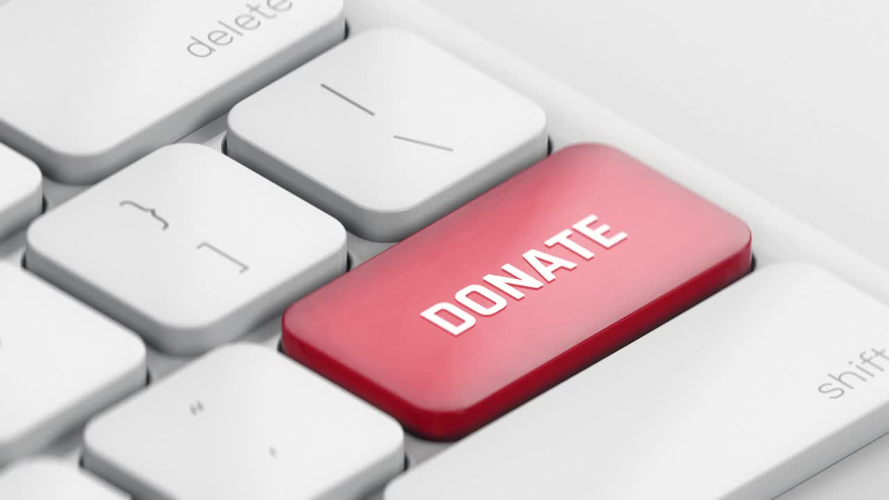 红色捐赠键盘按键，号召行动，捐款，慈善基金会视频素材