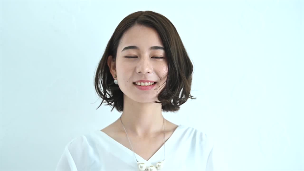 美丽的年轻亚洲女性的肖像。视频素材