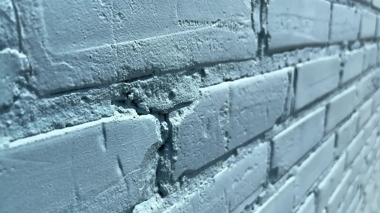 蓝色砖墙背景纹理慢动作视频视频素材