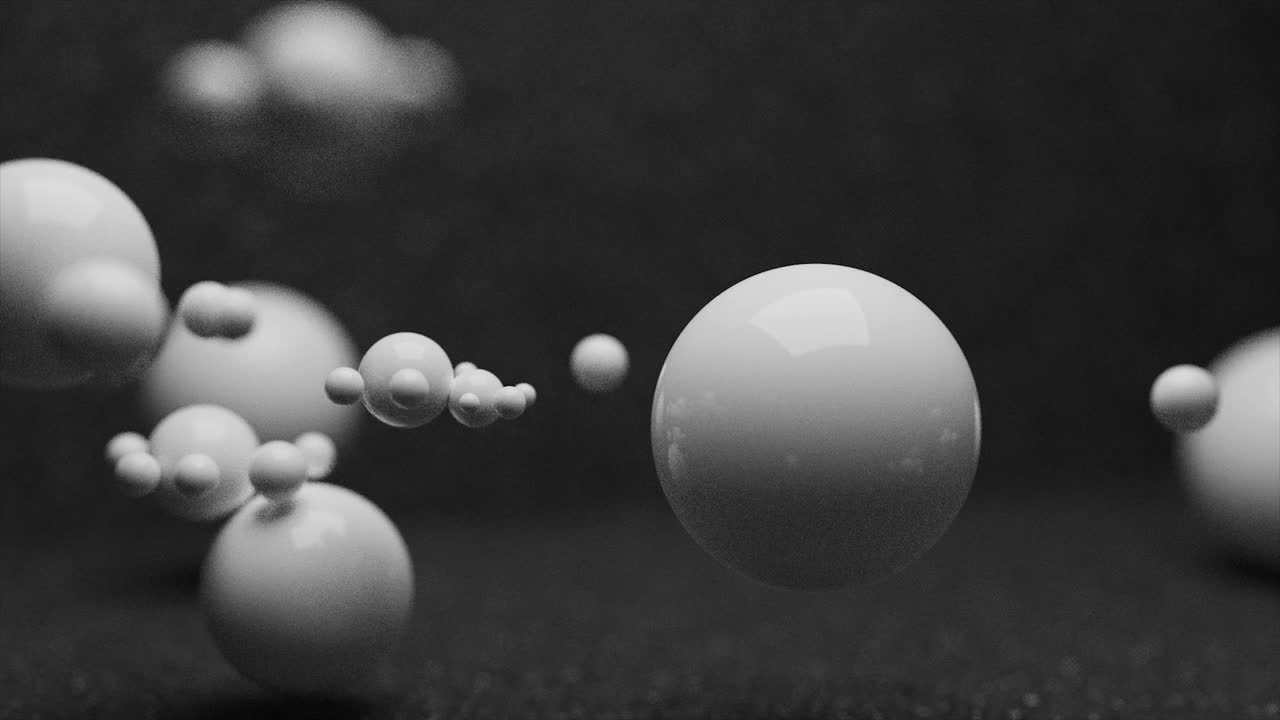 3D白色球体在黑色背景上打开，具有选择性聚焦效果视频下载