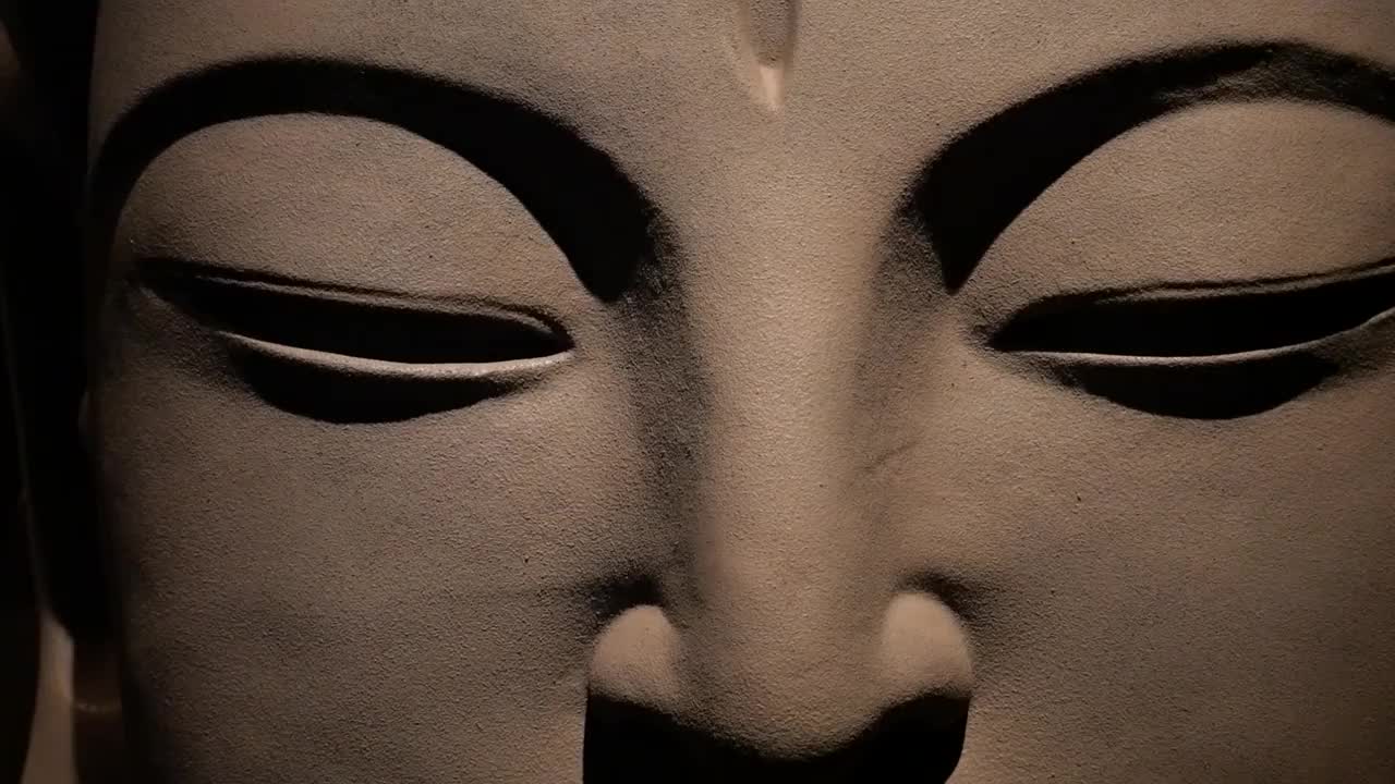 中国古代佛像脸部特写视频素材