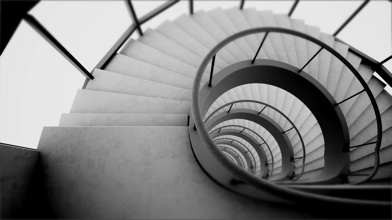广角黑白视频描绘一个抽象的螺旋楼梯的高角度视图。视频下载