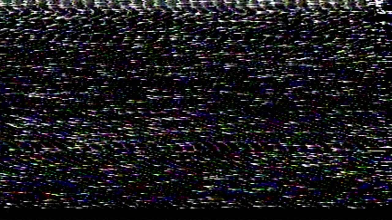 老式模拟电视发出的静态闪烁噪声。视频素材