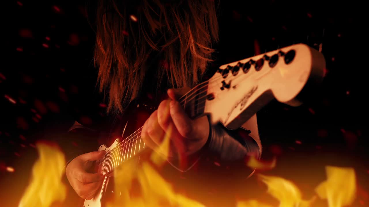 摇滚吉他手在火中演奏视频素材