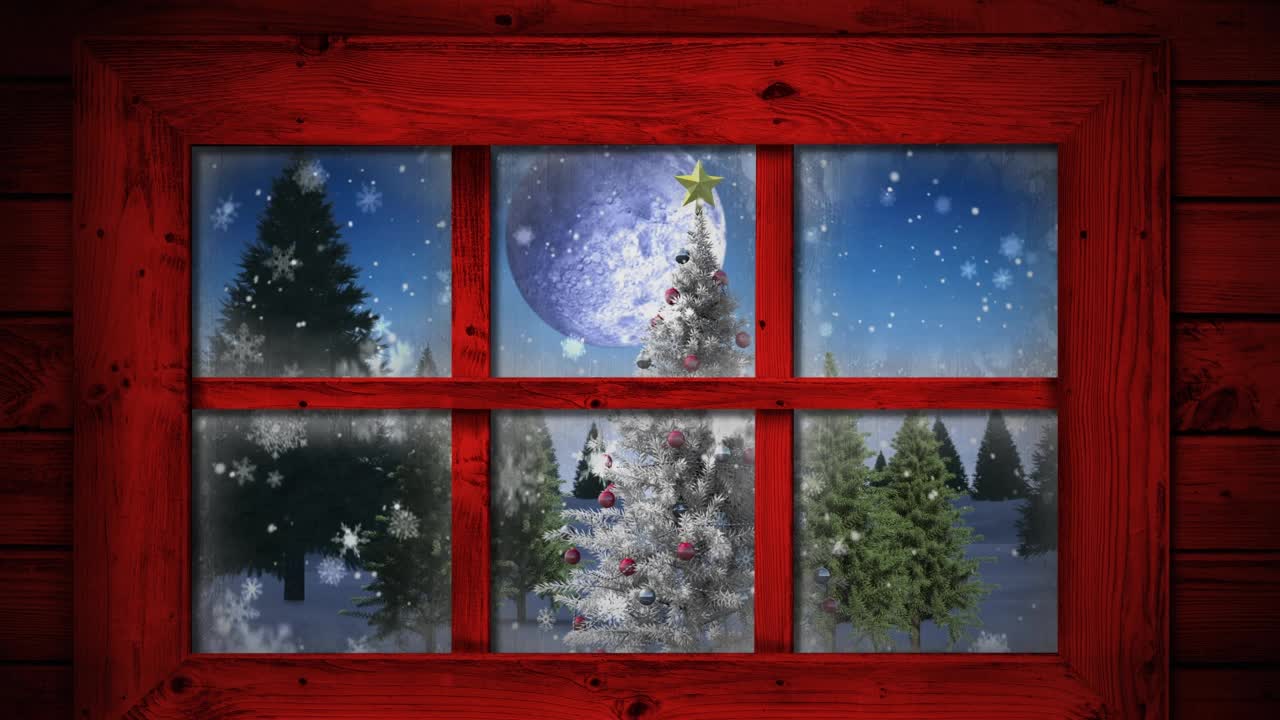 红色的窗框映衬着雪花飘落在圣诞树上的冬日风景视频素材