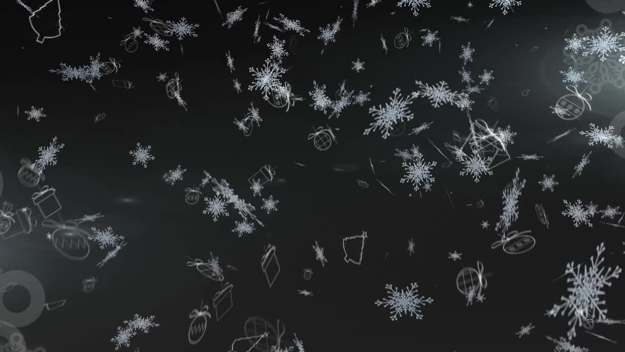 数字动画的多个雪花图标落在黑色背景视频素材